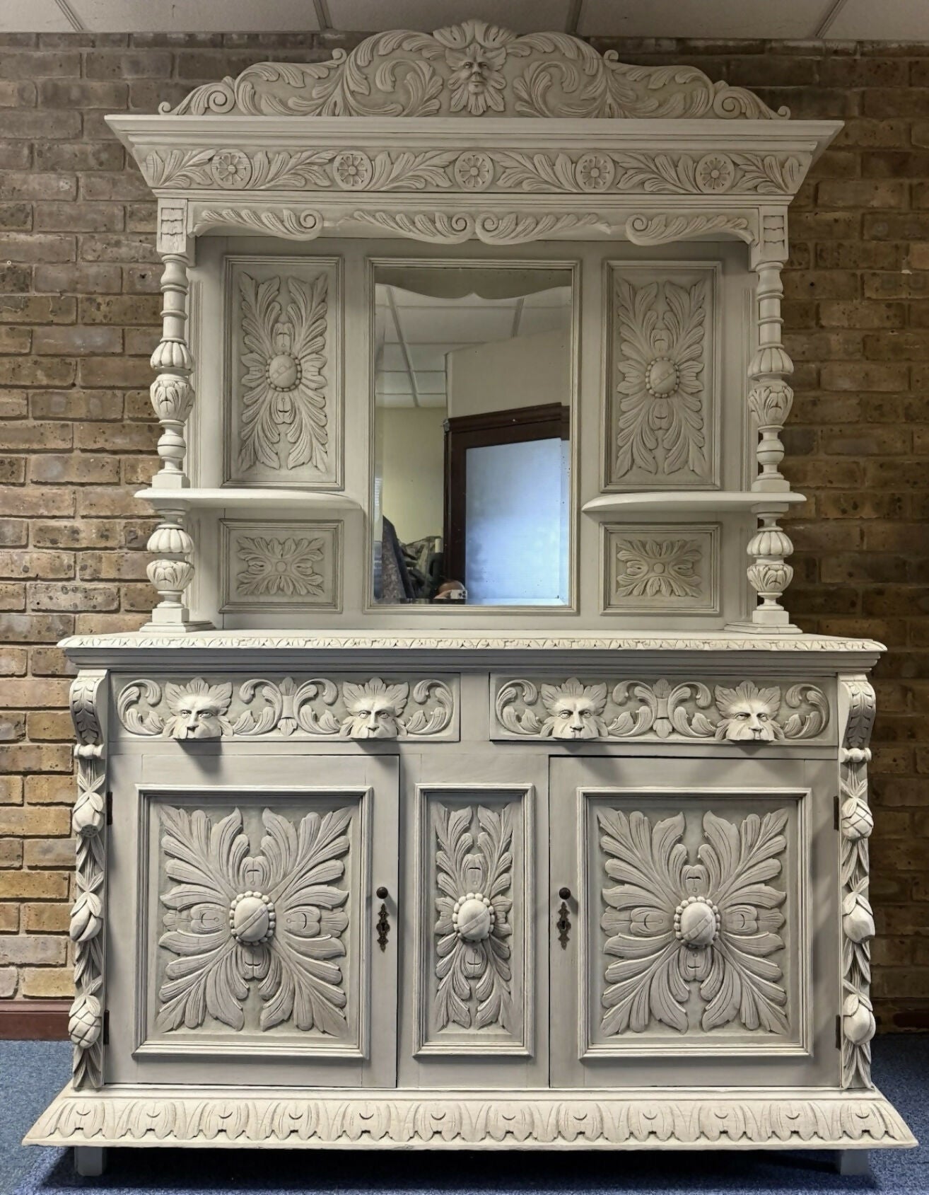 Victorian Dresser with ornate green man carvings.