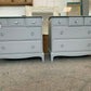 Pair Of Grey Painted Stag Minstrel Drawers