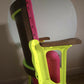 Neon pink cinema seat-side close up-seat up-Orange Otter