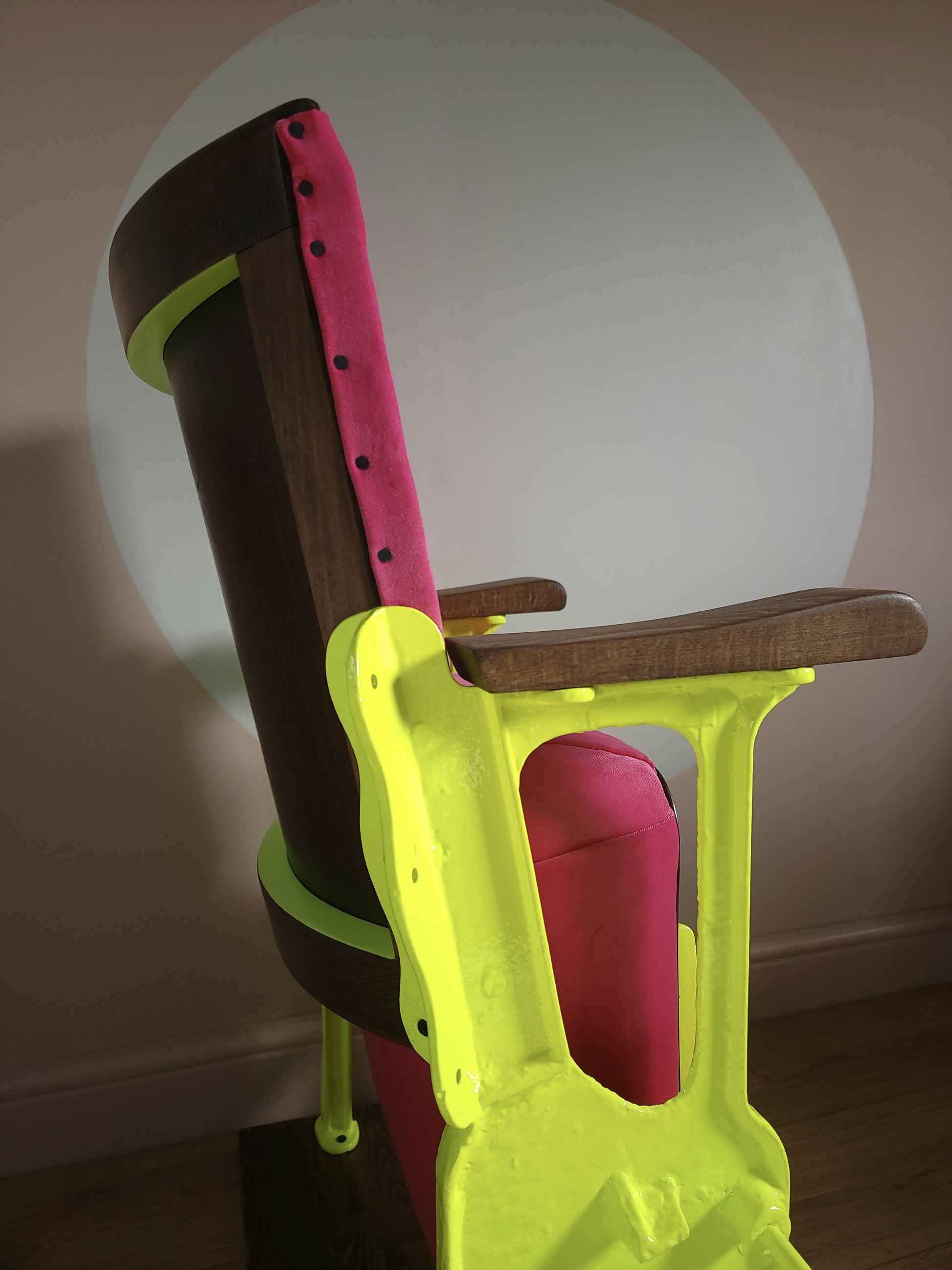 Neon pink cinema seat-side close up-seat up-Orange Otter