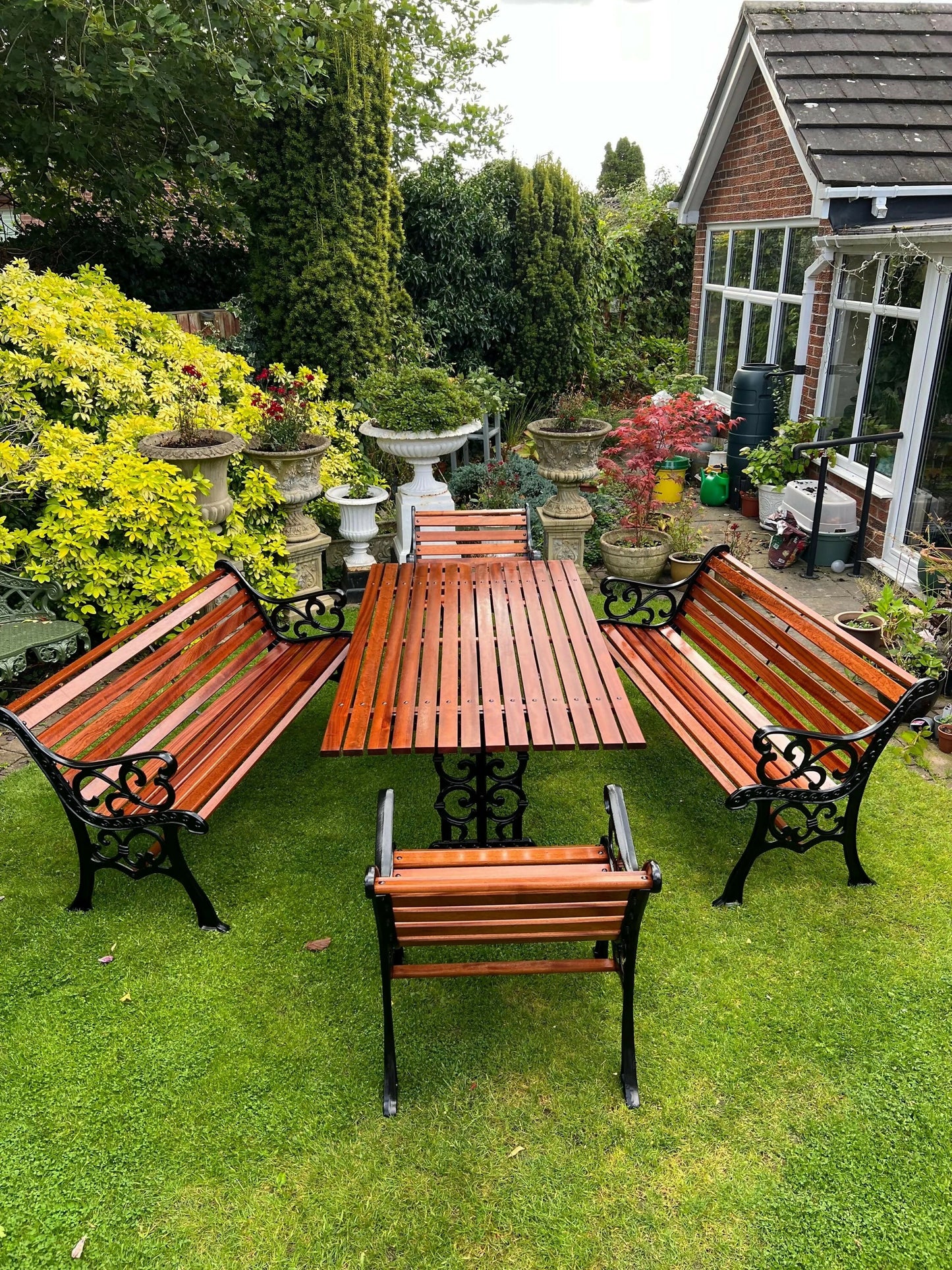 Black Vintage Cast Iron Patio Set adorned with Sapele Wood 3 seater Benches included