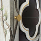 Clover shape bass handle on oriental cabinet with floral cabinet from close