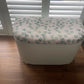Midsize lovingly repainted and reupholstered mid century Ottoman. Light green paint and updated material.