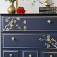 Nay and gold stag minstrel tall boy chest of drawers