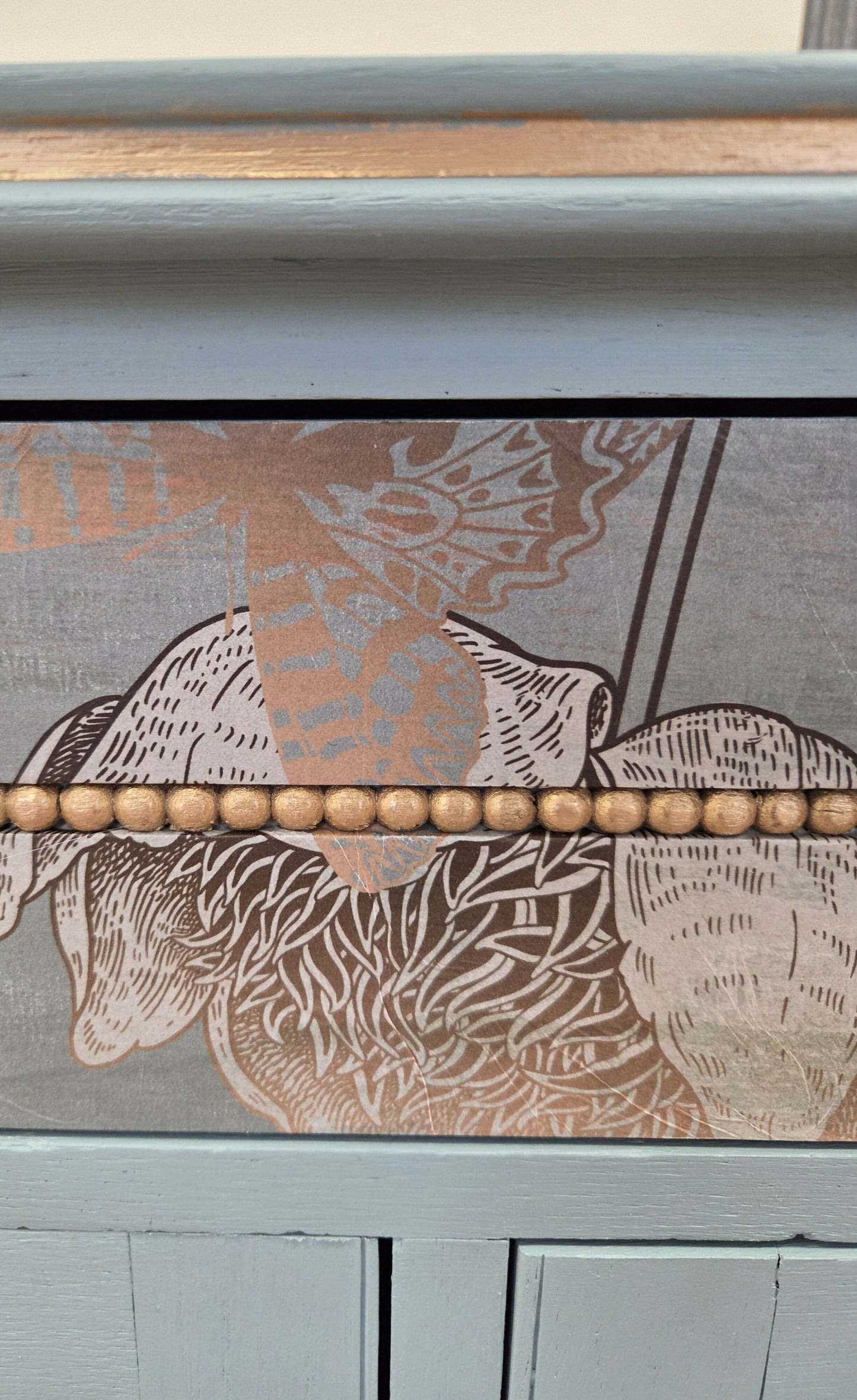 Vintage pale blue and gold drawered cupboard.