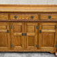 A WOOD BROTHERS OLD CHARM VINTAGE CARVED OAK SIDEBOARD / DRESSER BASE.
