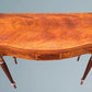 A Mahogany Serpentine Fronted Turn Over Top Tea Table