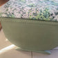 Small mid century Ottoman storage and seat. Sage green paint makes you choose the material.