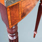 A Mahogany Serpentine Fronted Turn Over Top Tea Table