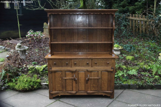A RUPERT / NIGEL GRIFFITHS MONASTIC CARVED OAK DERBYSHIRE DRESSER / SIDEBOARD.