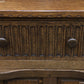 A RUPERT / NIGEL GRIFFITHS MONASTIC CARVED OAK DERBYSHIRE DRESSER / SIDEBOARD.