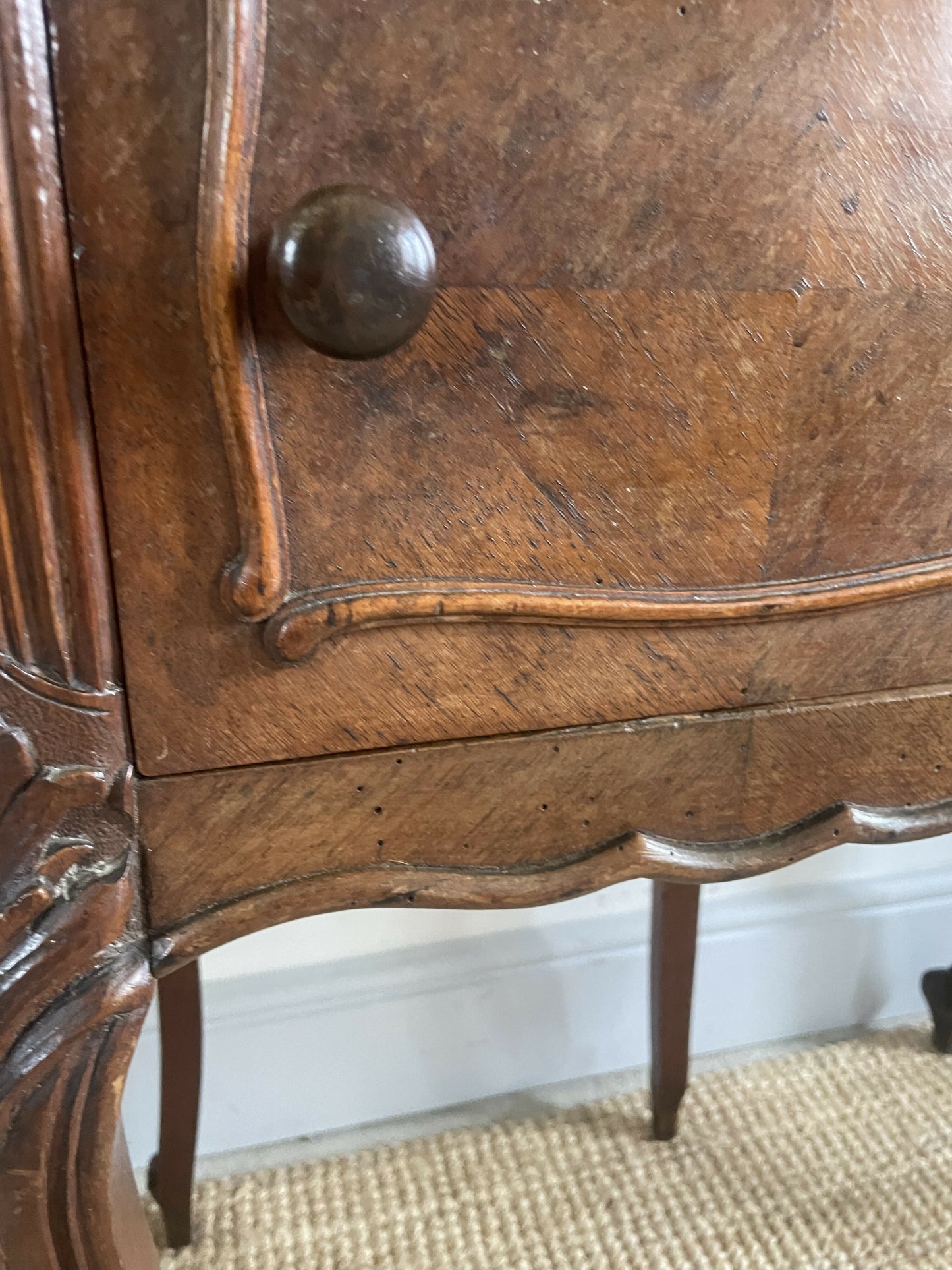 A near pair of antique French walnut and marble bedside tables