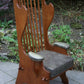 A RUPERT / NIGEL GRIFFITHS CARVED OAK DERBYSHIRE WING BACK LEATHER / ARMCHAIR