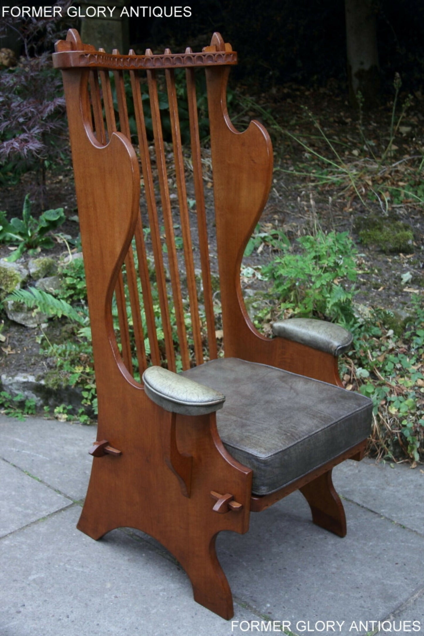 A RUPERT / NIGEL GRIFFITHS CARVED OAK DERBYSHIRE WING BACK LEATHER / ARMCHAIR