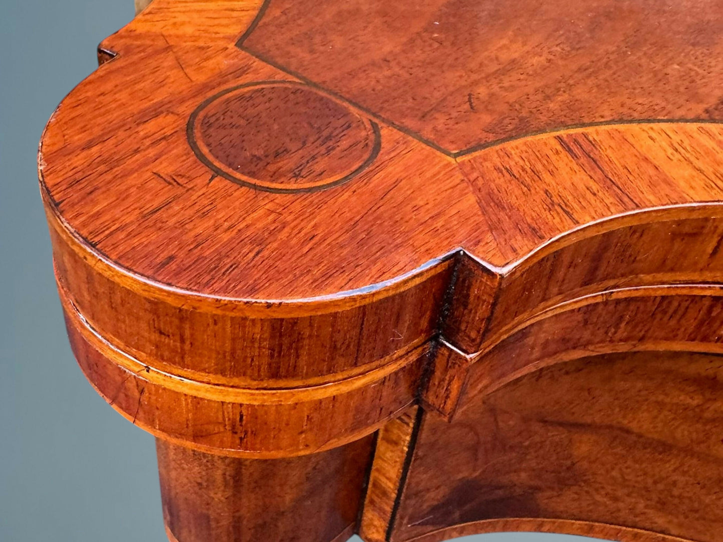 A Mahogany Serpentine Fronted Turn Over Top Tea Table