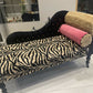 Baby chaise lounge in velvet zebra print and faux mink fur roll top
