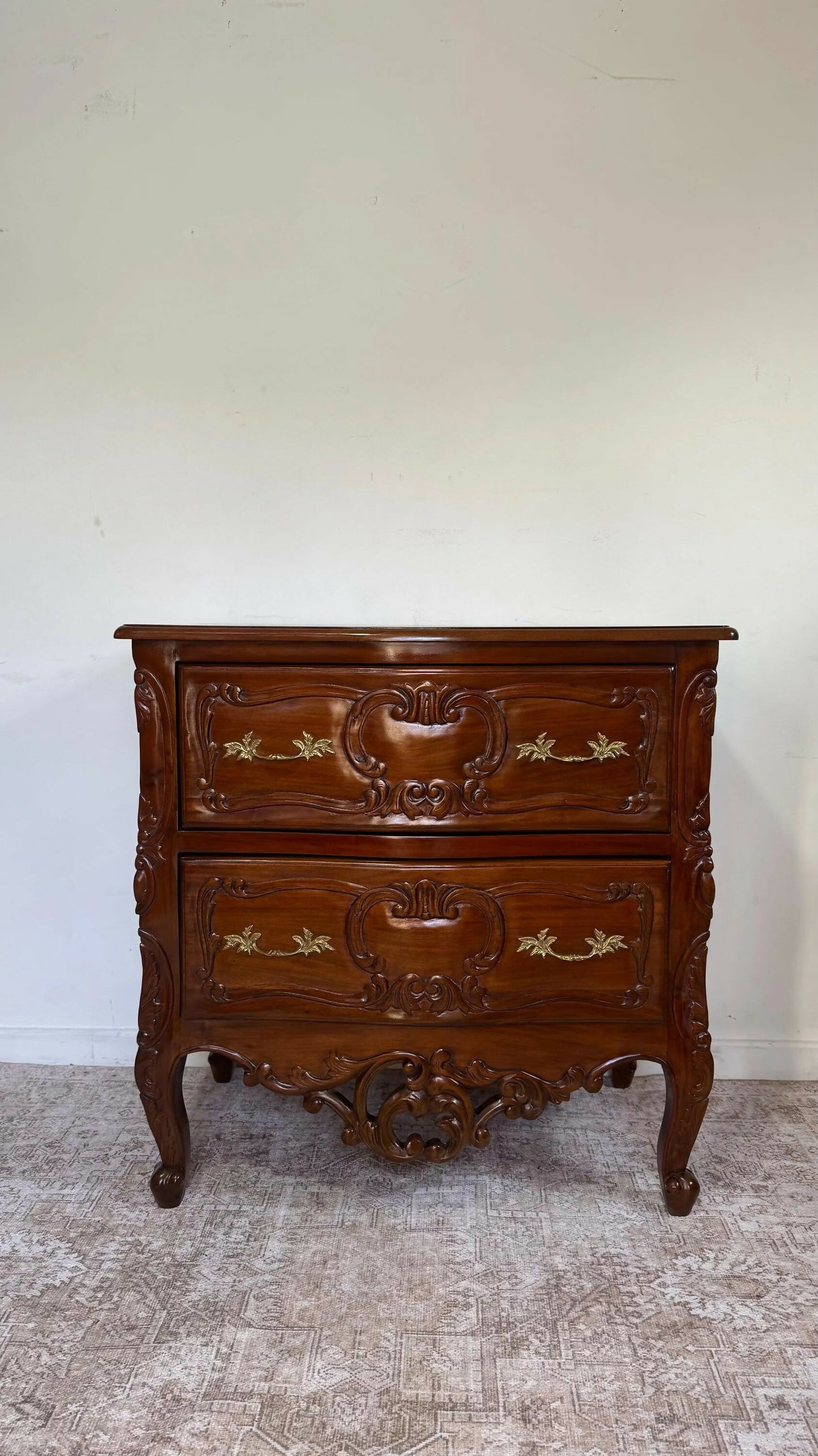 French Rococo style carved mahogany chest of drawers