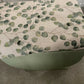 Small mid century Ottoman storage and seat. Sage green paint makes you choose the material.