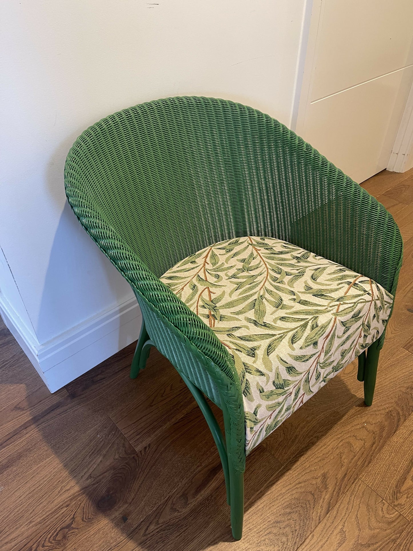 Green painted Lloyd loom 1961 chair with matching fabric
