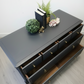 Stag minstrel chest of drawers in dark grey