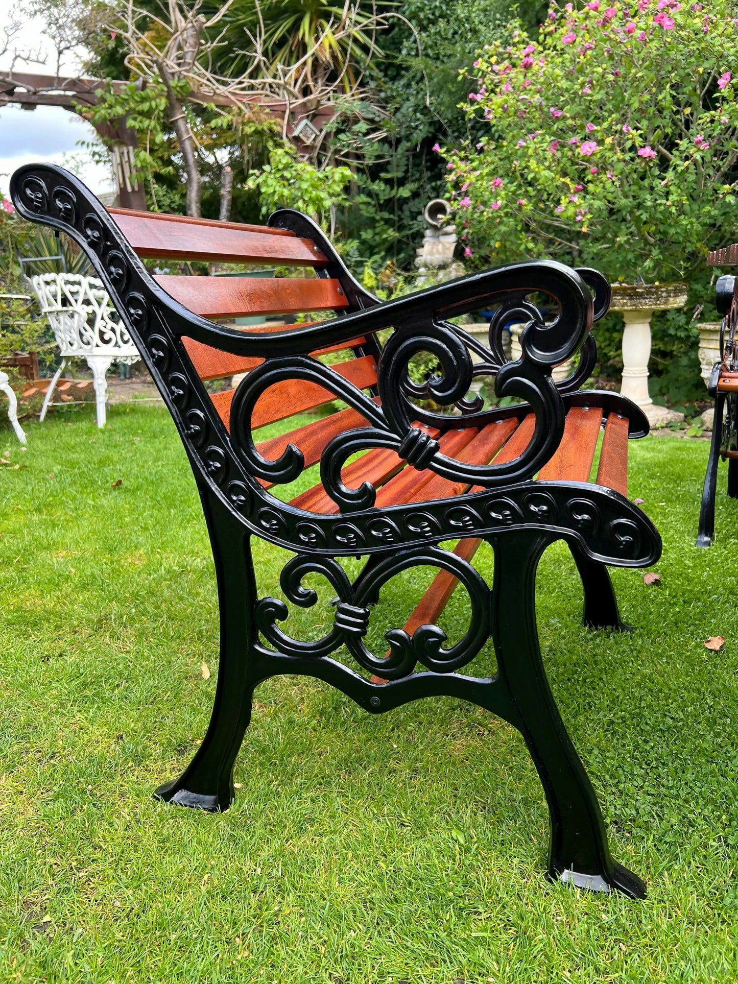 Black Vintage Cast Iron Patio Set adorned with Sapele Wood 3 seater Benches included