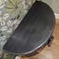 Reproduction Maison Demi Lune Console in black, manufactured by Gallery Direct Ltd