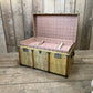 antique beige leather banded travel trunk with keys