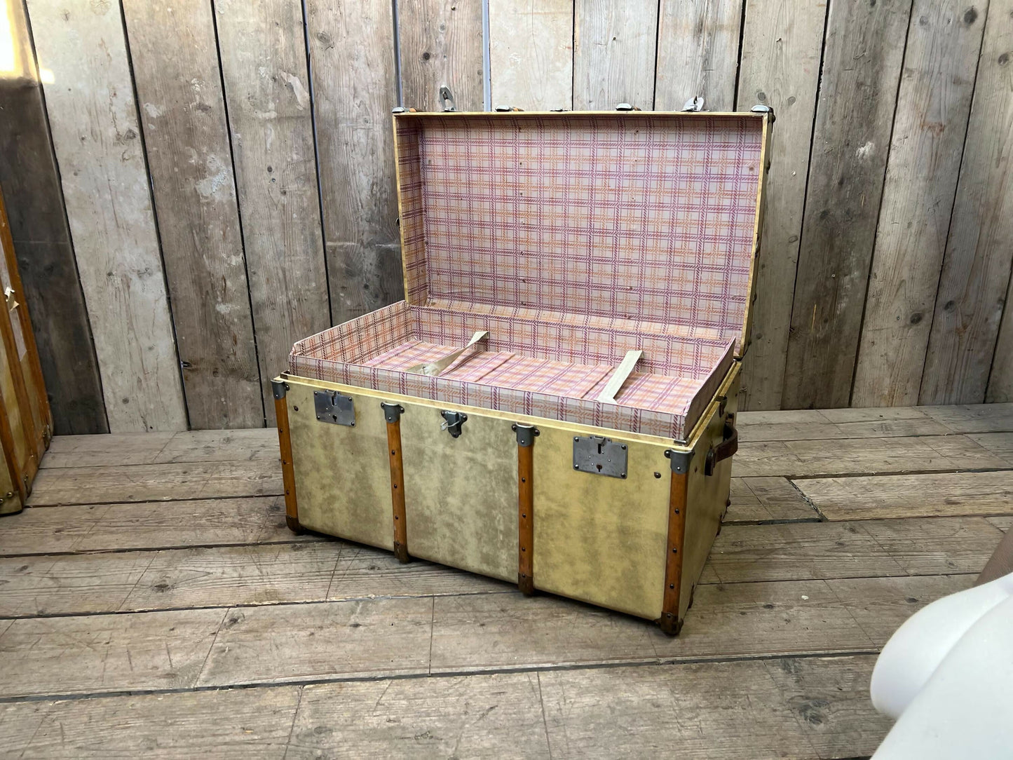 antique beige leather banded travel trunk with keys