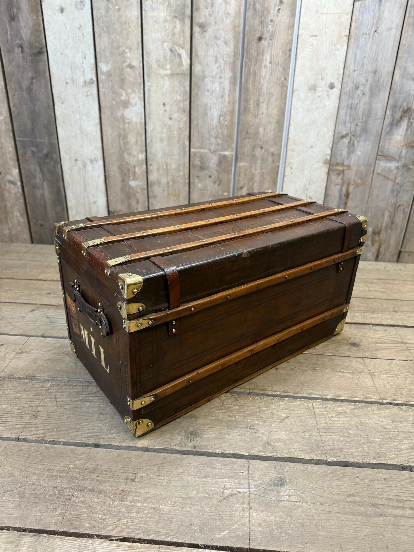 Antique full leather and brass bound travel trunk coffee table