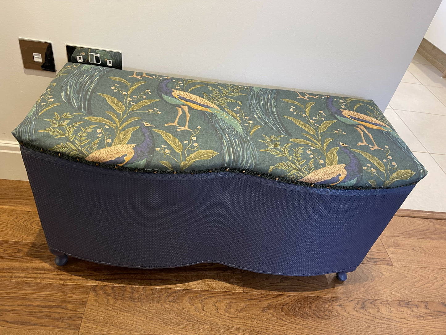 Peacock themed ottoman. Mid century refurbished