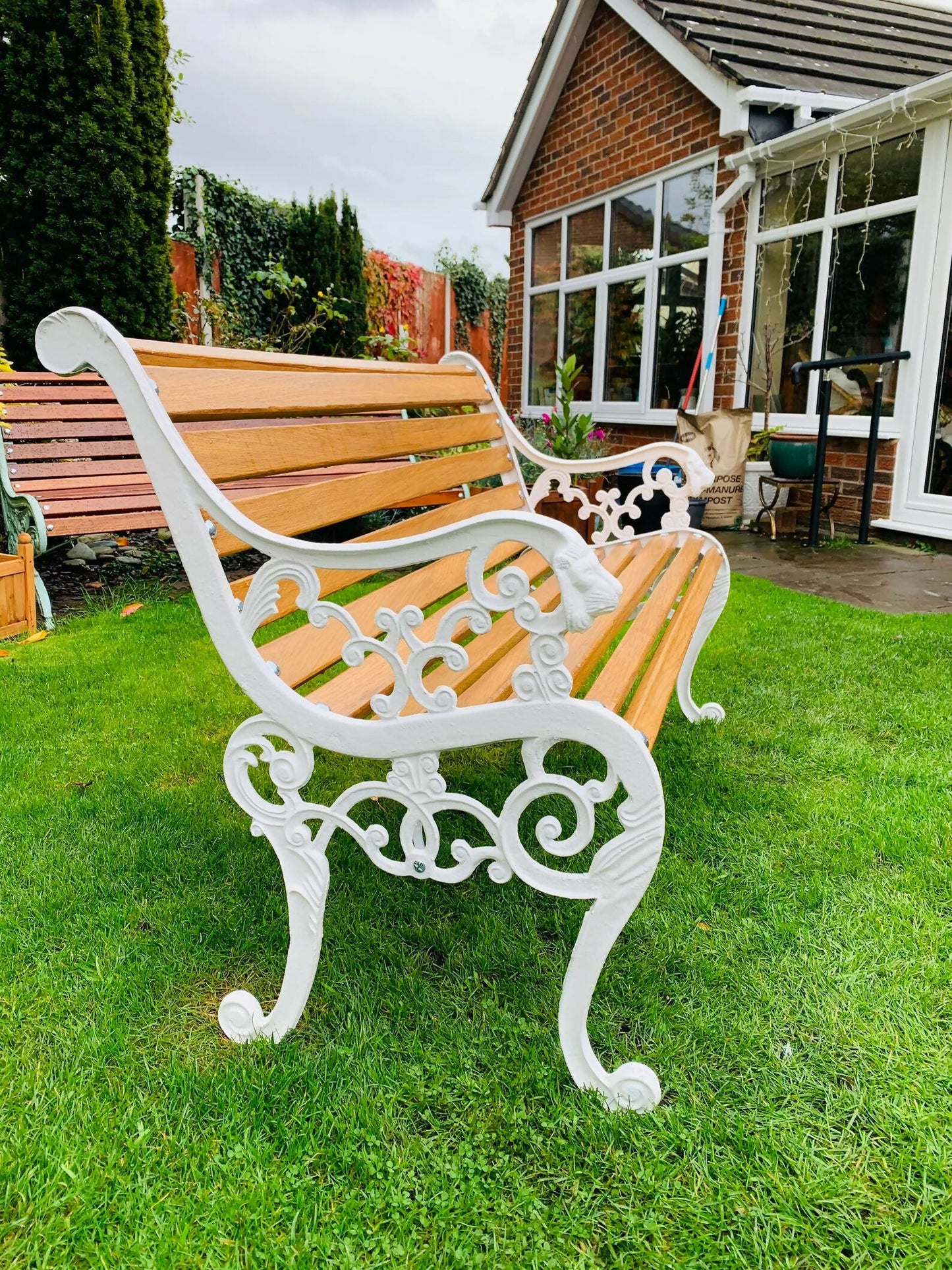 Antique Cast Iron Lions Head Bench Finished with European Oiled White Oak Slats