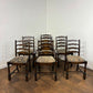 Vintage Set of Seven Oak Ladder Back Dining Chairs Including Carver Chair