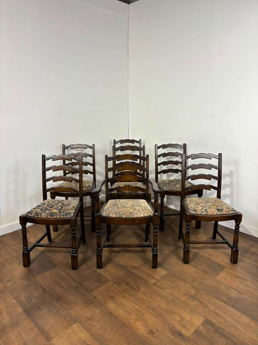 Vintage Set of Seven Oak Ladder Back Dining Chairs Including Carver Chair