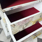 Red fabric layed drawers of bespoke chinoiserie cabinet