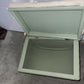 Small mid century Ottoman storage and seat. Sage green paint makes you choose the material.