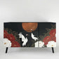 Black sideboard with 3 drawers and doors on each side, front decorated Japanese design