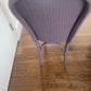 Stylish Lloyd loom accent chair very Matt aubergine paint and matching cotton lily themed fabric