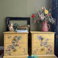 Pair of Upcycled Distressed Yellow Tables with Hidden Green-Blue Undertones & Elegant Floral Bird Design