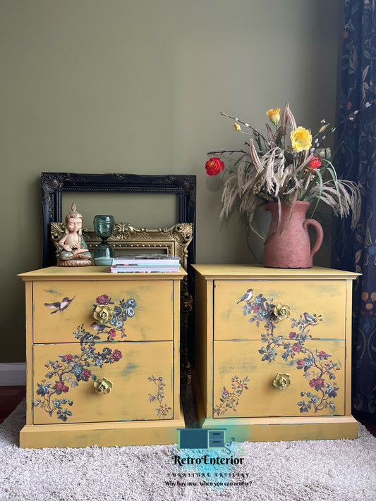 Pair of Upcycled Distressed Yellow Tables with Hidden Green-Blue Undertones & Elegant Floral Bird Design