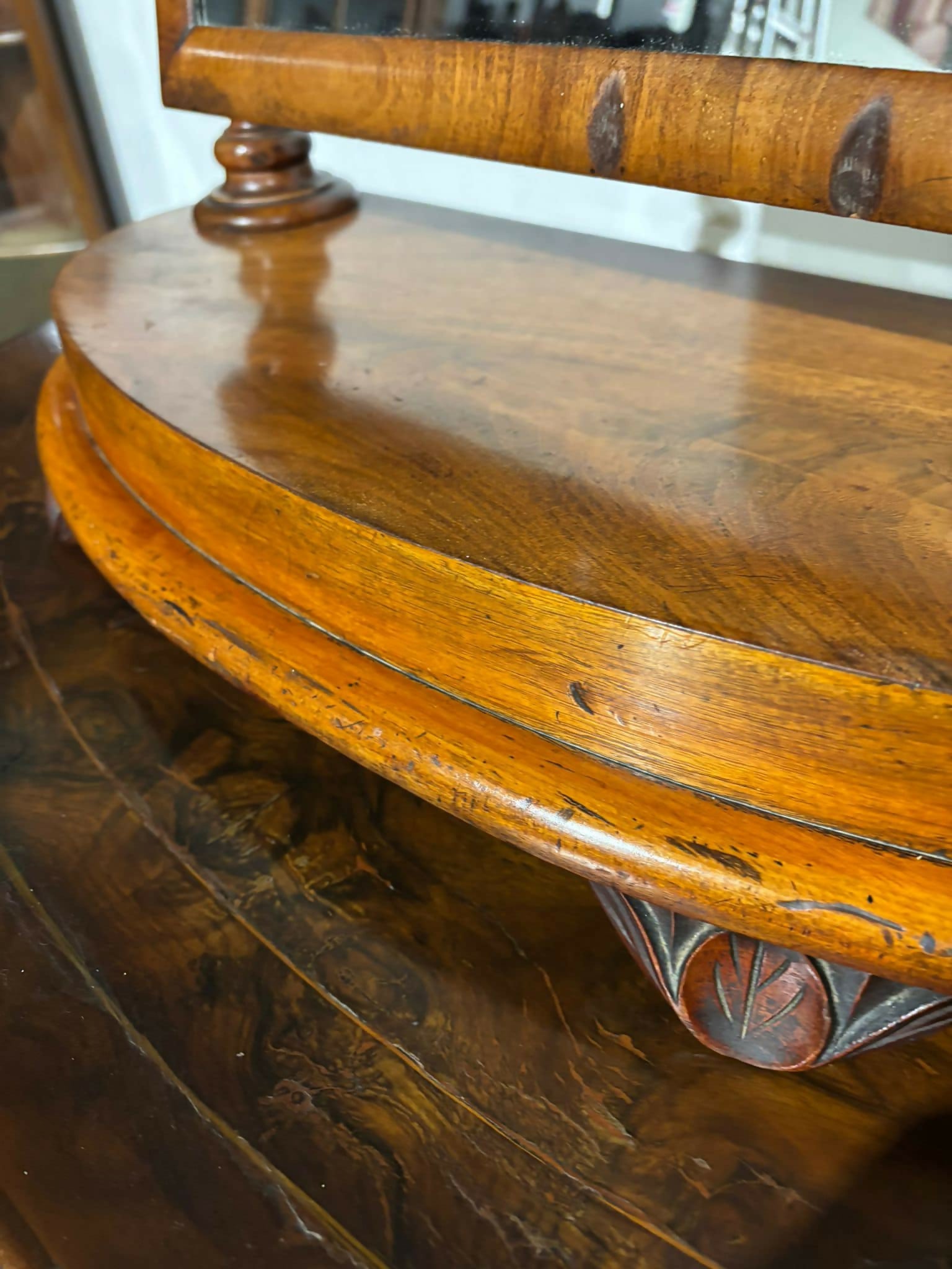 Victorian walnut dressing table mirror, supported on turned carved supports.56