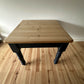 Pine dining table with stripped pine top and blue base