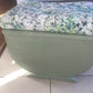 Small mid century Ottoman storage and seat. Sage green paint makes you choose the material.