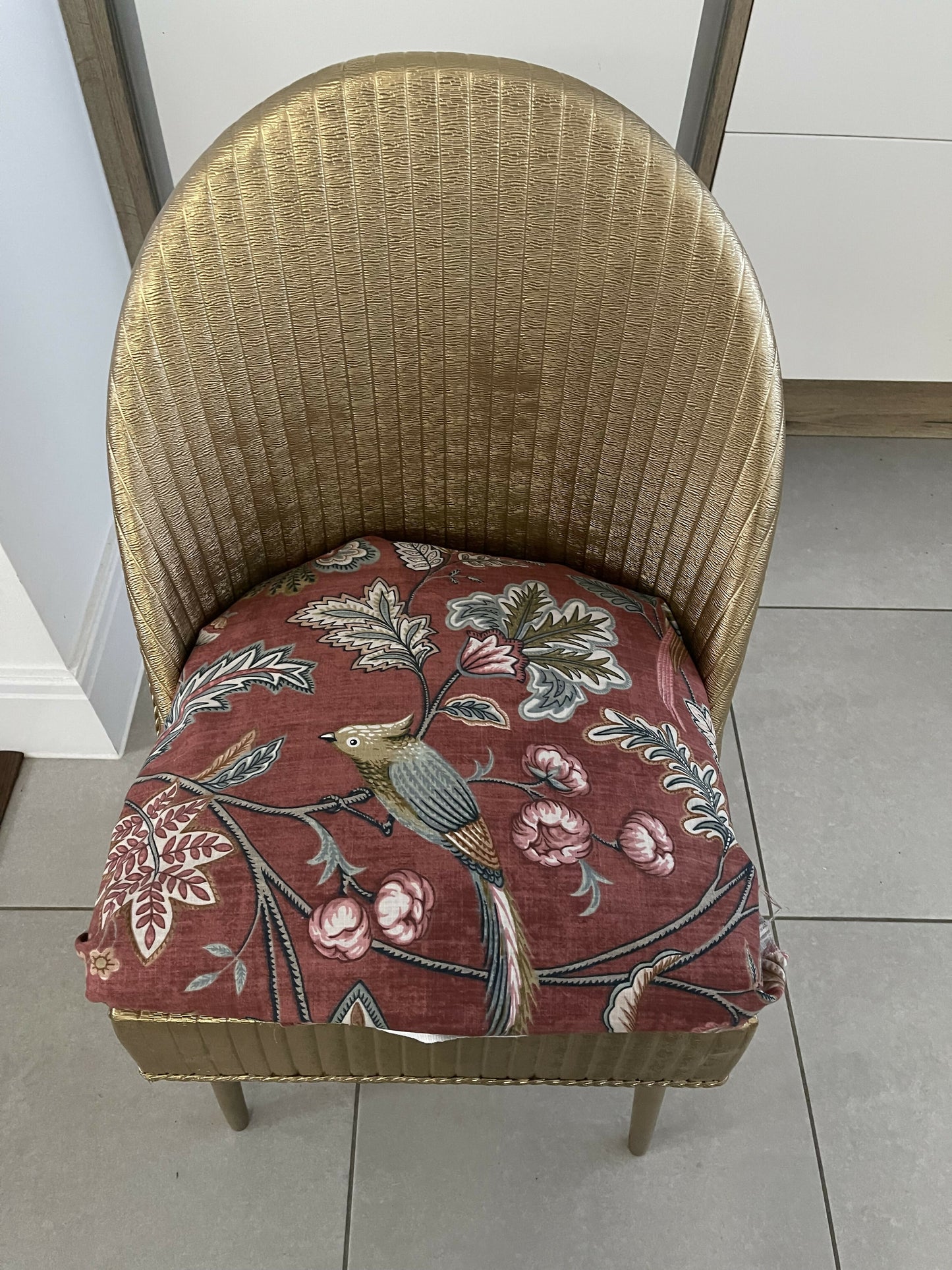 Accent chair. Gold painted wipe clean plastic with your choice of fabric seat. Removable with small storage space beneath.
