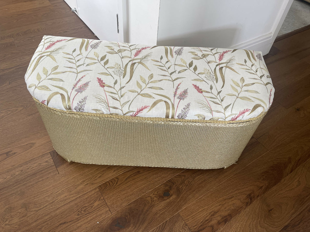 Gold painted mid century Ottoman with new marching cotton fabric top