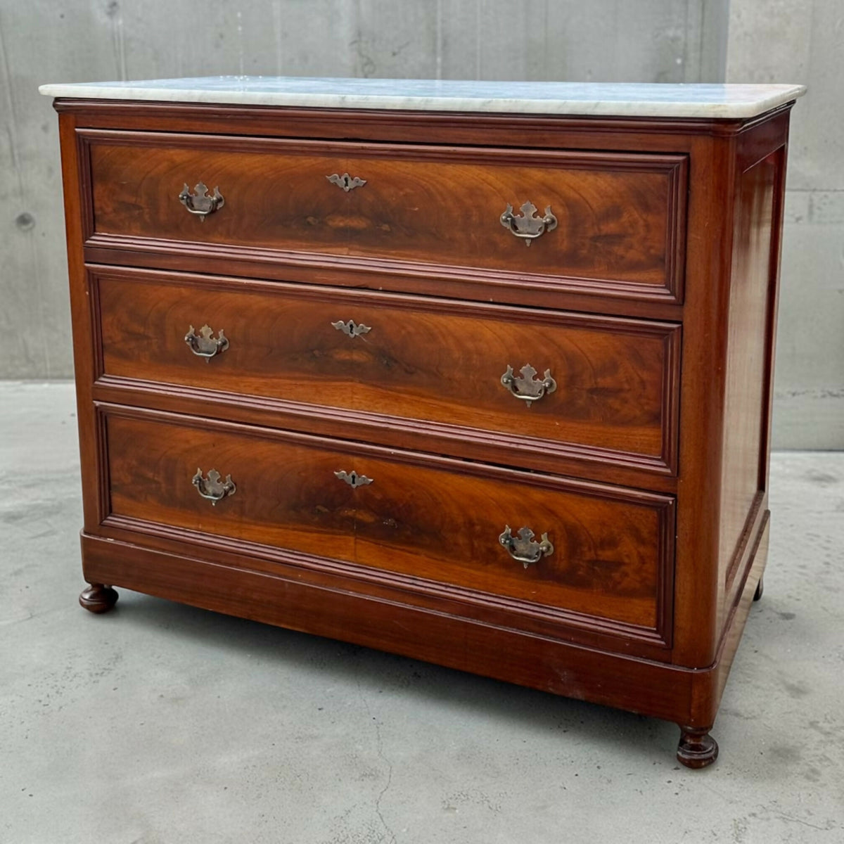 Antique Flame Mahogany Louis XVI Style Marble Top chest of drawers