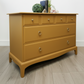 Stag minstrel chest of drawers in mustard