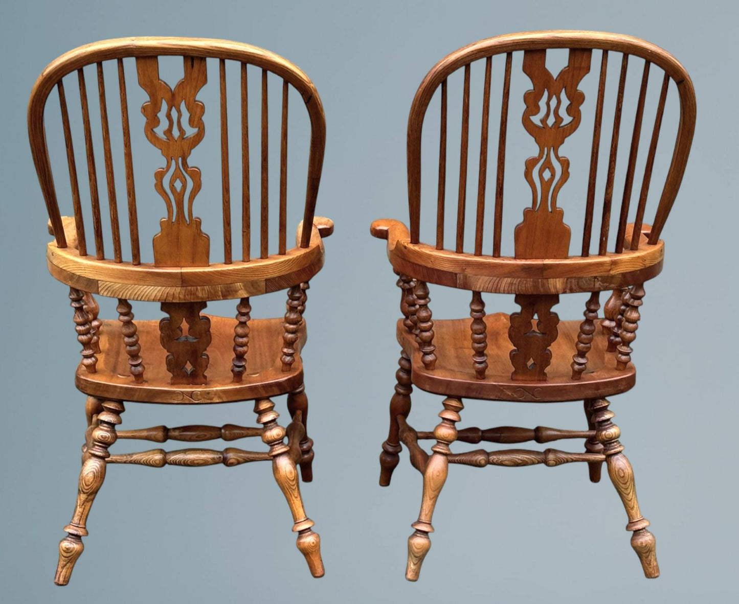 A Large Pair of Ash Broad Arm Windsor Chairs