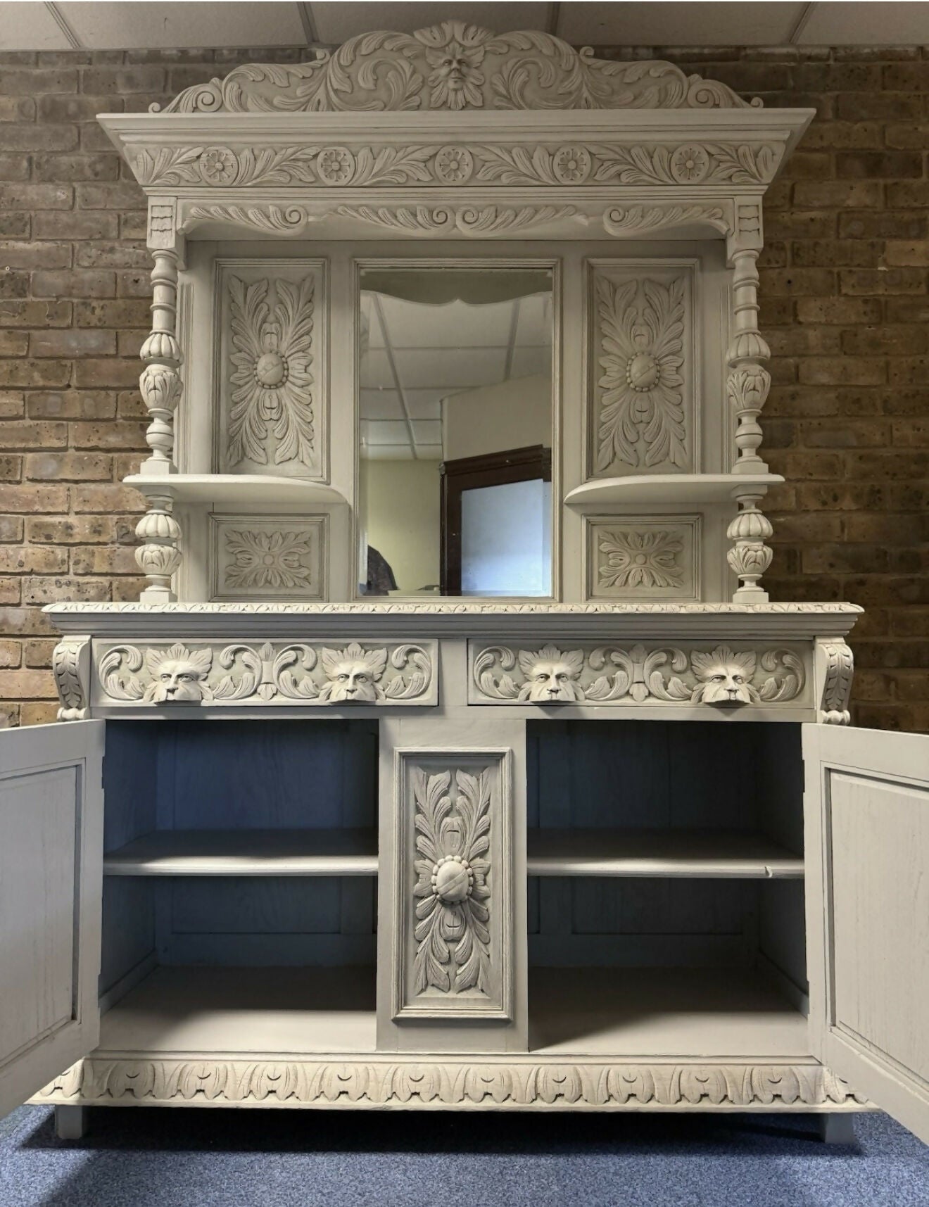 Victorian Dresser with ornate green man carvings.