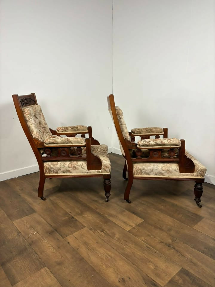 Pair of Victorian Carved Walnut Upholstered Library Armchairs