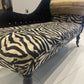 Baby chaise lounge in velvet zebra print and faux mink fur roll top
